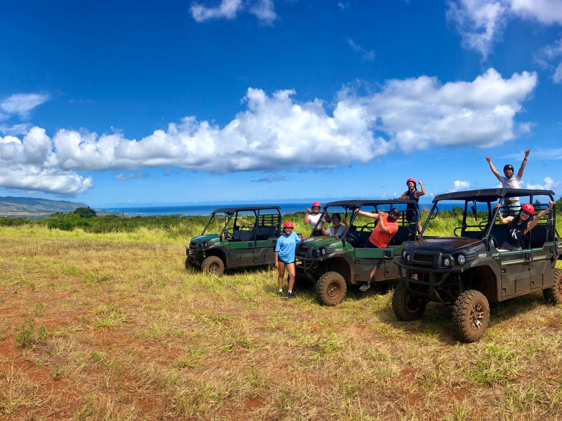 a truck is parked in a grassy field