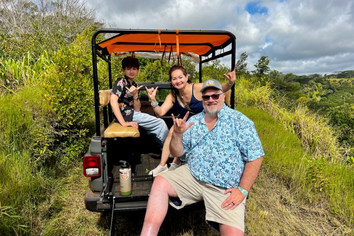 a man riding on the back of a truck