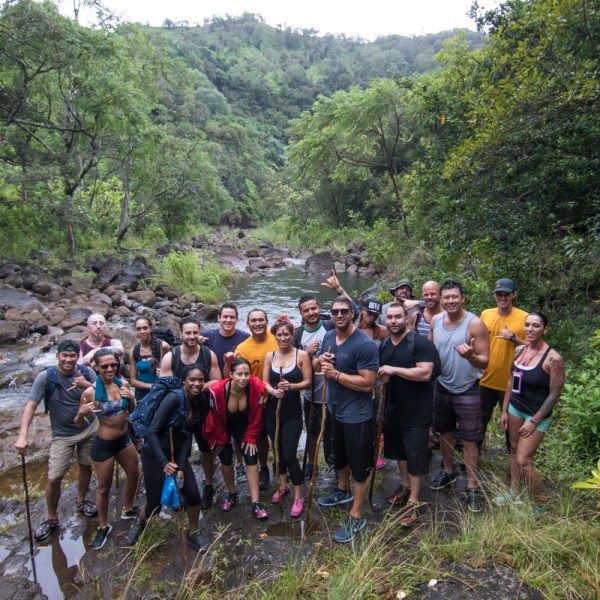 a group of people in a forest